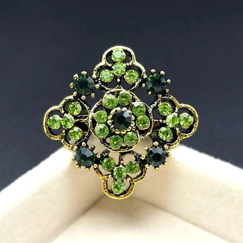 Yellow Gold with Emerald and Peridot Green Crystal Ornate Pin Back Brooch